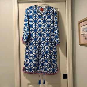 Cute dress with Pom Pom detail and tassel cinch waist.